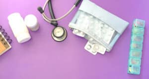 medical instruments on purple background