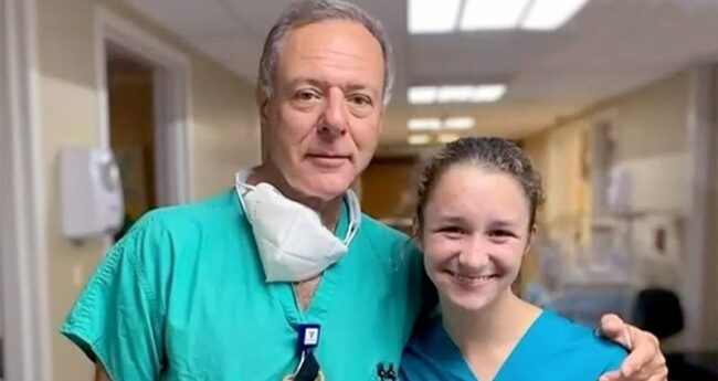 medical professional posing with student