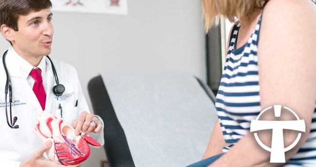 doctor speaking with patient