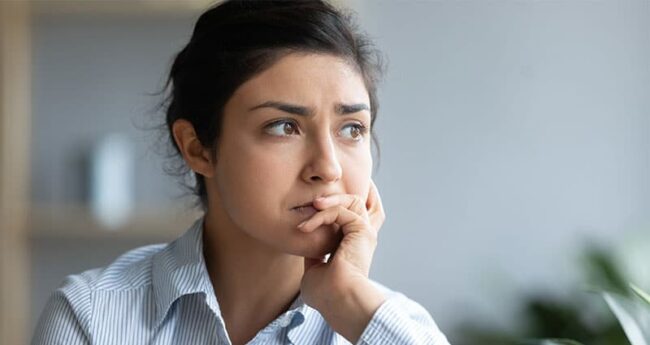 Woman looking distressed.