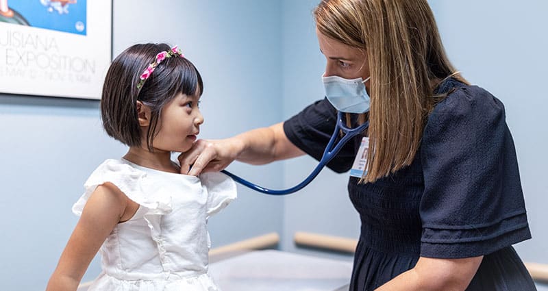 Medical professional with child