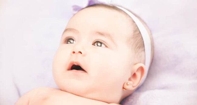 ChildrensHealth_20210831_PierceChildEars infant with pierced ears