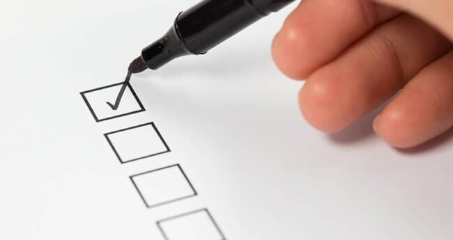 paper and pen check list - top box being checked