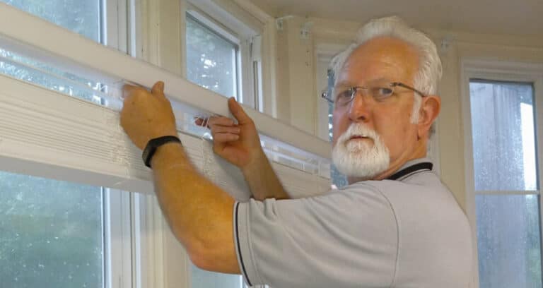 senior hanging window blinds indoors
