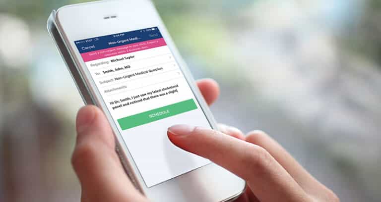 Person types on a smartphone