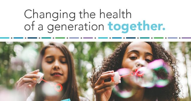 children blowing bubbles