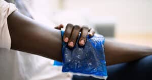 close up of blue ice pack on elbow