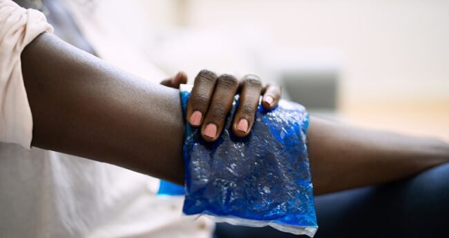 close up of blue ice pack on elbow