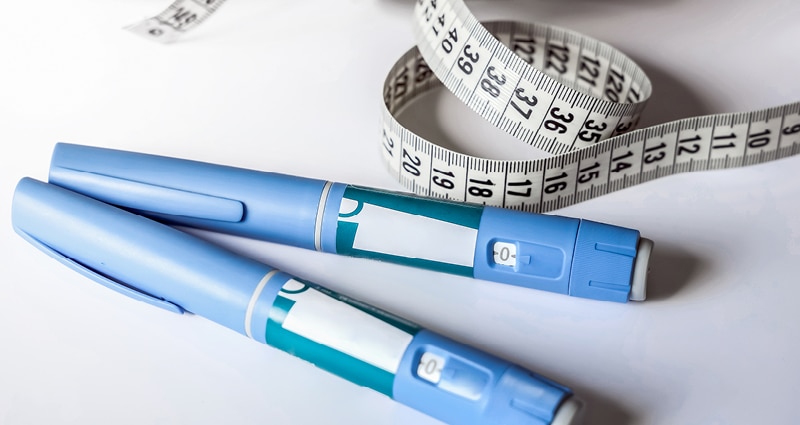 injectables and measuring tape