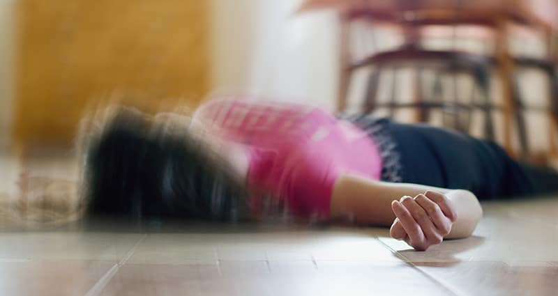 woman laying on floor