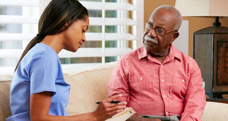provider listening to older man talk