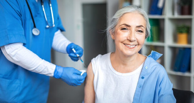 Woman receiving vaccine