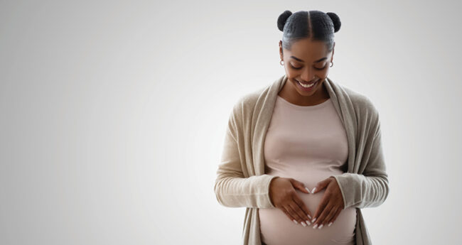 Expecting mom holding her tummy