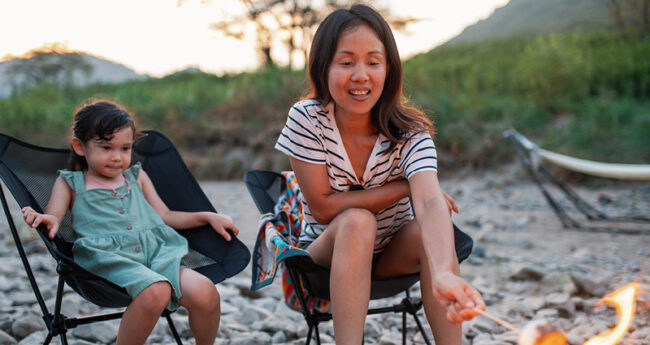 Mom and Daughter by Campfire