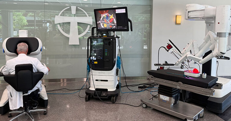 A surgeon does a demonstration of new da Vinci 5 surgical robot